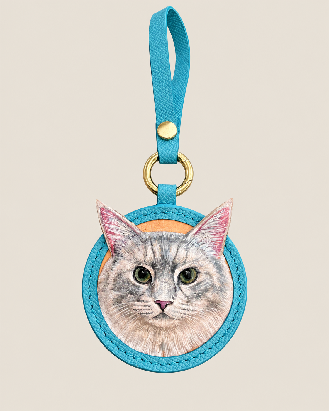Blue leather color example for a custom Pawrelic pet portrait keychain