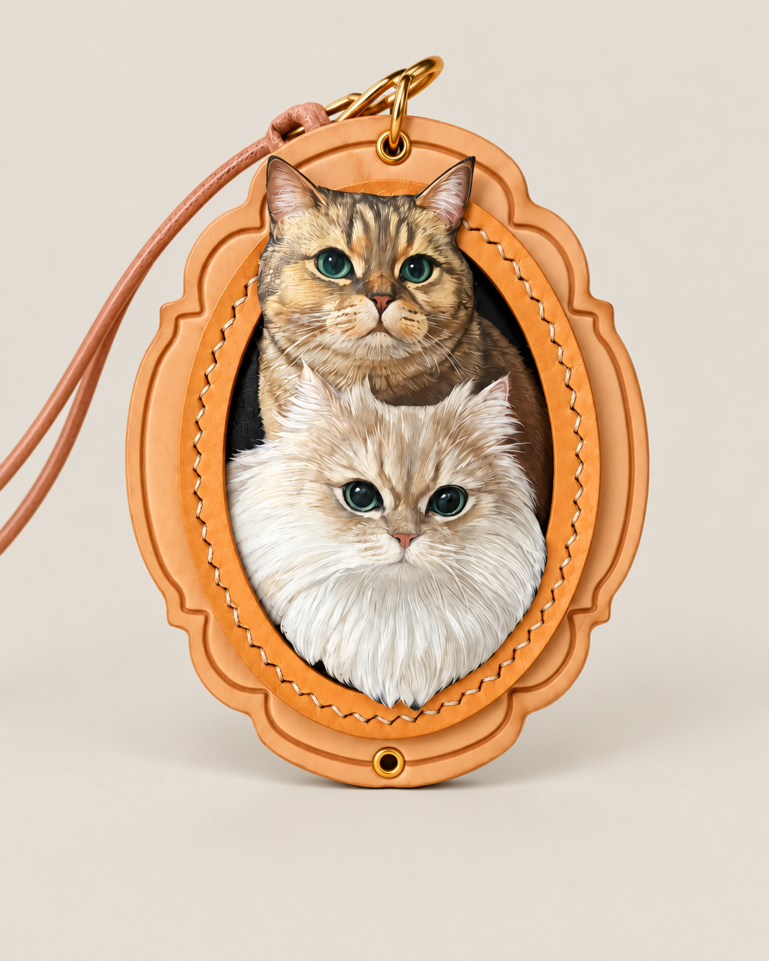 Orange scalloped leather charm with two cat portraits and a matching strap