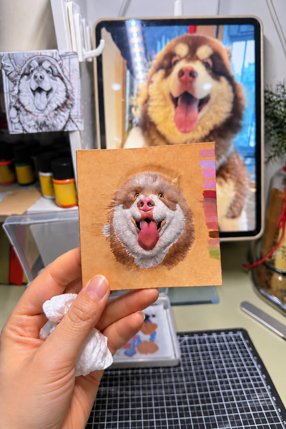 Hand-colored leather pet portrait beside the reference photo
