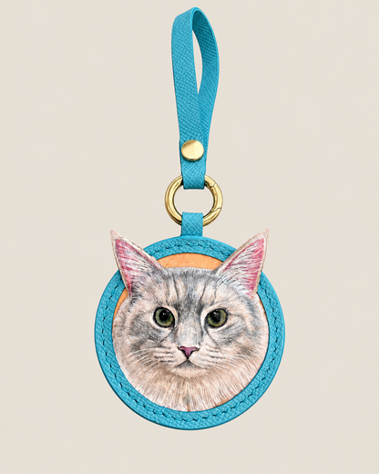 Blue leather color example for a custom Pawrelic pet portrait keychain